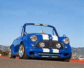 AUT 22 RK1340 01
1966 Austin Mini Cooper Speedster Convertible Custom Blue White Stripe Low 3/4 Front View On Pavement