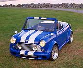 AUT 22 RK1344 06
1966 Austin Mini Cooper Speedster Convertible Custom Blue White Stripe 3/4 Front View On Grass