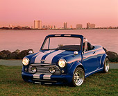 AUT 22 RK1345 05
1966 Austin Mini Cooper Speedster Convertible Blue White Stripe 3/4 Front On Grass