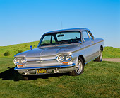 AUT 22 RK1381 02
1964 Chevrolet Corvair Spyder Silver 3/4 View On Grass