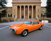 AUT 22 RK1407 03
1968 Pontiac Firebird Orange 3/4 Front View On Pavement By Building