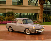 AUT 22 RK1427 05
1964 Volkswagen 1500 Sedan Gray 3/4 Side View By Building