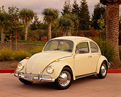 AUT 22 RK1436 02
1967 VW Bug Ivory 3/4 Front View By Trees And Bushes