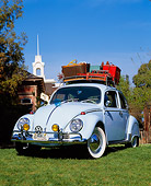 AUT 22 RK1463 04
1966 VW Bug Light Blue With Roof Rack Low 3/4 Front View On Grass