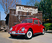 AUT 22 RK1468 04
1966 Volkswagen Beetle Red Front 3/4 View On Pavement By Barn