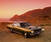 AUT 22 RK1501 05
1969 Dodge Hemi Coronet RT Green 3/4 Front View On Sand By Ocean And Rocks Filtered