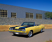 AUT 22 RK1513 02
1969 Plymouth Road Runner Convertible Yellow And Black Stripes 3/4 Front View On Pavement
