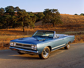 AUT 22 RK1537 06
1968 Plymouth GTX 440 Convertible Blue 3/4 Front View On Pavement By Trees
