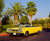 AUT 22 RK1550 01
1967 Plymouth GTX Convertible Yellow 3/4 Front View On Pavement By Palm Trees