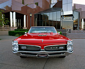 AUT 22 RK1571 03
1967 Pontiac GTO Convertible Red Wide Angle Head On Shot By Building