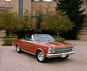 AUT 22 RK1574 05
1966 Ford Galaxie 500 Convertible Emberglo 3/4 Front View On Pavement By Trees