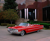 AUT 22 RK1584 01
1963 Ford Galaxie 500XL Red Convertible 3/4 Front View On Pavement By Building And Trees