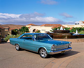 AUT 22 RK1588 05
1965 Ford Galaxie 500 Turquoise 3/4 Front View On Pavement By Water Fountain