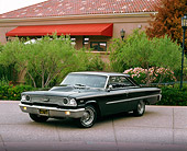 AUT 22 RK1596 01
1963 1/2 Ford Galaxie 500XL Black 3/4 Front View On Pavement By Trees And Flowers