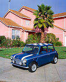 AUT 22 RK1627 02
1969 Austin Mini Cooper Blue And White 3/4 Front View On Pavement By House