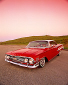 AUT 22 RK1657 03
1960 Chevrolet Impala Red And White Lowrider 3/4 Front View On Pavement