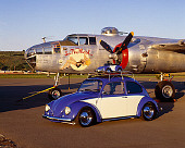AUT 22 RK1727 04
1965 VW Bug Ragtop With Model Car On Top Blue And White