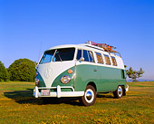 AUT 22 RK1749 01
1965 Volkswagen Westfalia Camper Green And White Low 3/4 Front View On Grass Blue Sky
