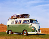 AUT 22 RK1752 02
1965 Volkswagen Westfalia Camper Green And White 3/4 Front View On Grass Blue Sky