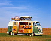 AUT 22 RK1753 06
1965 Volkswagen Westfalia Camper Green And White 3/4 Front View Doors Open On Grass