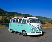 AUT 22 RK1783 01
1960 VW Deluxe 23 Window Seafoam And White 3/4 Front View On Pavement Hills Background