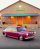 AUT 22 RK1900 03
1967 MG 1100 Series Burgundy 3/4 Front View On Pavement By Building At Dusk