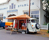 AUT 22 RK1918 01
1965 VW EZ Camper Van White With Accesories By Old Building
