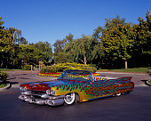 AUT 22 RK1958 01
1960 Cadillac Convertible Custom Flames 3/4 Front View On Pavement By Trees
