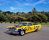 AUT 22 RK1963 05
1964 Chevrolet El Camino Custom Yellow Purple Flames 3/4 Front View On Pavement Trees Background