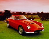 AUT 22 RK1992 03
1964 Apollo 3500GT Red 3/4 Front View On Grass Hill Trees Background