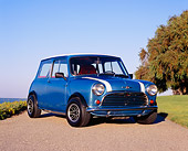 AUT 22 RK2008 01
1962 Morris Mini 850 Blue White Stripe Low 3/4 Front View On Pavement Blue Sky