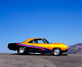 AUT 22 RK2033 03
1967 Plymouth Barracuda Orange And Black Profile View On Pavement Blue Sky