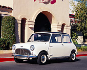 AUT 22 RK2054 02
1966 Austin Mini Cooper S White Black Top 3/4 Side View On Pavement By Building