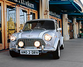AUT 22 RK2061 02
1969 Rover Mini Silver White Stripe 3/4 Front View On Pavement