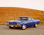 AUT 22 RK2082 02
1969 Chevy El Camino Blue Black Stripe 3/4 Front View On Pavement By Dry Grass Hills