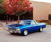 AUT 22 RK2085 03
1969 Chevy El Camino Blue Black Stripe 3/4 Front View On Pavement By Building