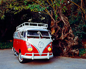 AUT 22 RK2093 01
1964 Volkswagen 13 Window Deluxe Red And White 3/4 Front View By Trees