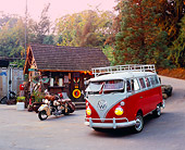 AUT 22 RK2096 02
1964 Volkswagen 13 Window Deluxe Bus Red And White Front 3/4 View On Pavement With 1948 Indian Bike