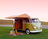 AUT 22 RK2103 03
1961 Volkswagen Westphalia Camper Green And Gray With Tent 3/4 Side View On Grass