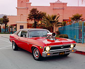 AUT 22 RK2131 01
1969 Chevy Nova SS Red 3/4 Front View On Pavement By Building