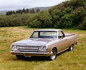 AUT 22 RK2145 04
1965 Chevy El Camino Metalic Driftwood 3/4 Front View On Grass By Bushes