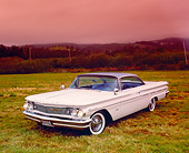 AUT 22 RK2148 02
1960 Pontiac Bonneville White And Blue 3/4 Front View On Grass