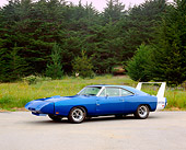 AUT 22 RK2154 02
1969 Dodge Daytona Charger Blue 3/4 Side View On Pavement By Trees