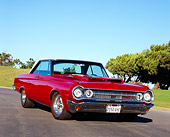 AUT 22 RK2181 03
1964 Dodge Polara 500 Red And White Low 3/4 Front View On Pavement By Grass And Trees