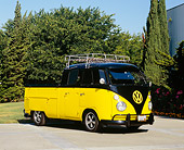 AUT 22 RK2190 02
1963 Volkswagen Crew Cab Black And Yellow 3/4 Front View On Pavement By Trees