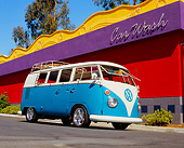 AUT 22 RK2201 02
1967 Volkswagen Kombi Bus Turquoise And White Low 3/4 Side View By Colorful Building