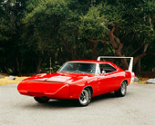 AUT 22 RK2210 02
1969 Dodge Charger Daytona Red 3/4 Front View On Pavement By Trees