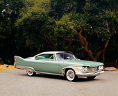 AUT 22 RK2215 05
1960 Plymouth Fury Green And White 3/4 Side View On Pavement By Trees
