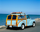 AUT 22 RK2231 04
1967 Morris Minor 1000 Woody Light Blue 3/4 Rear View On Pavement By Water