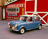 AUT 22 RK2249 02
1965 Morris Mini Cooper Blue And White 3/4 Front View On Pavement By Barn Station